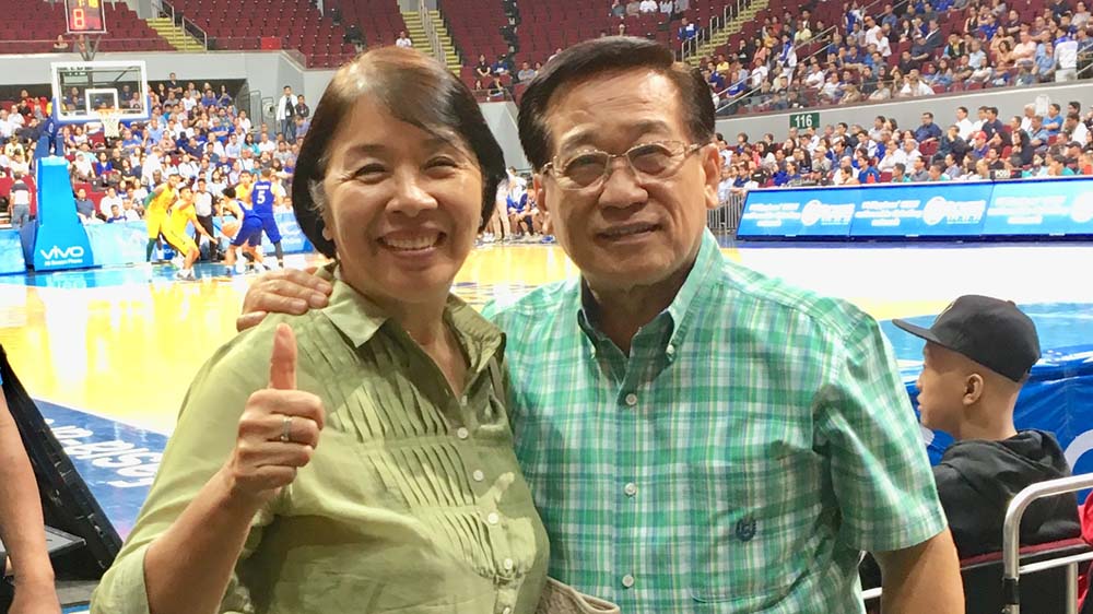 Atty. Romy and Mrs. Milagros Macalintal at the MOA Arena during the exciting UAAP game between FEU and Ateneo on Nov 22, 2017